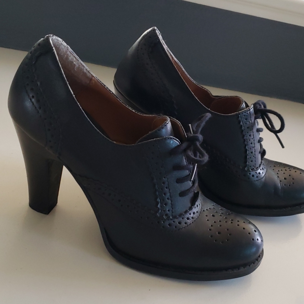 Lace up boots.